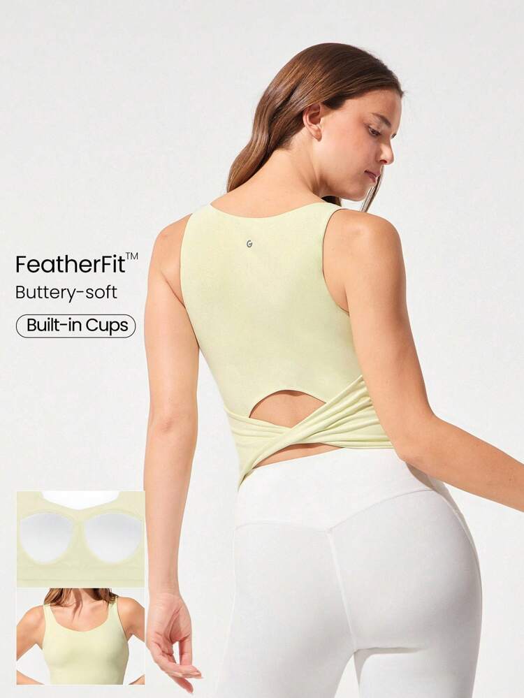 FeatherFit™ Débardeur actif à encolure en cœur avec brassière intégrée absorbante et douce, dos torsadé, pour yoga, pilates, studio et usage quotidien décontracté. Faible impact.