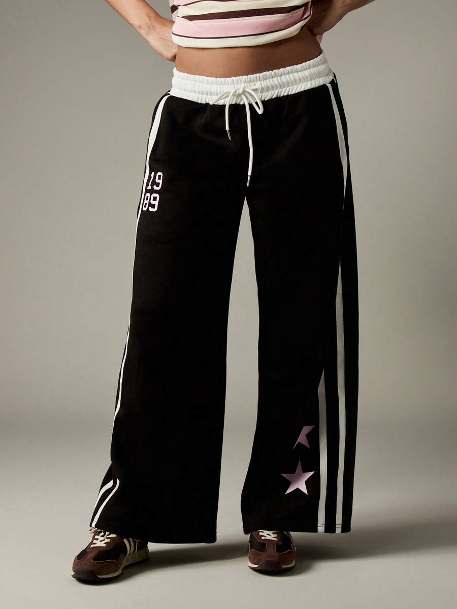 MISSGUIDED Varsity Wide Leg Track Pants Collegiate Style Joggers With Star Details Drawstring Waist Lounge Sweatpants Fall Winter Casual Comfort Streetwear - Black and White - View 1