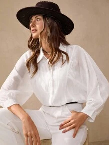 Wildy Blusa blanca de mujer con botones para uso casual en la oficina, camisa de manga larga de color blanco sólido, versátil y casual para mujeres, ideal para salir, fiestas, otoño y maestras - Blanco - Ver 1
