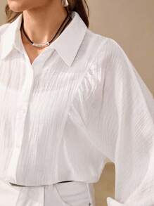 Wildy Blusa blanca de mujer con botones para uso casual en la oficina, camisa de manga larga de color blanco sólido, versátil y casual para mujeres, ideal para salir, fiestas, otoño y maestras - Blanco - Ver 7