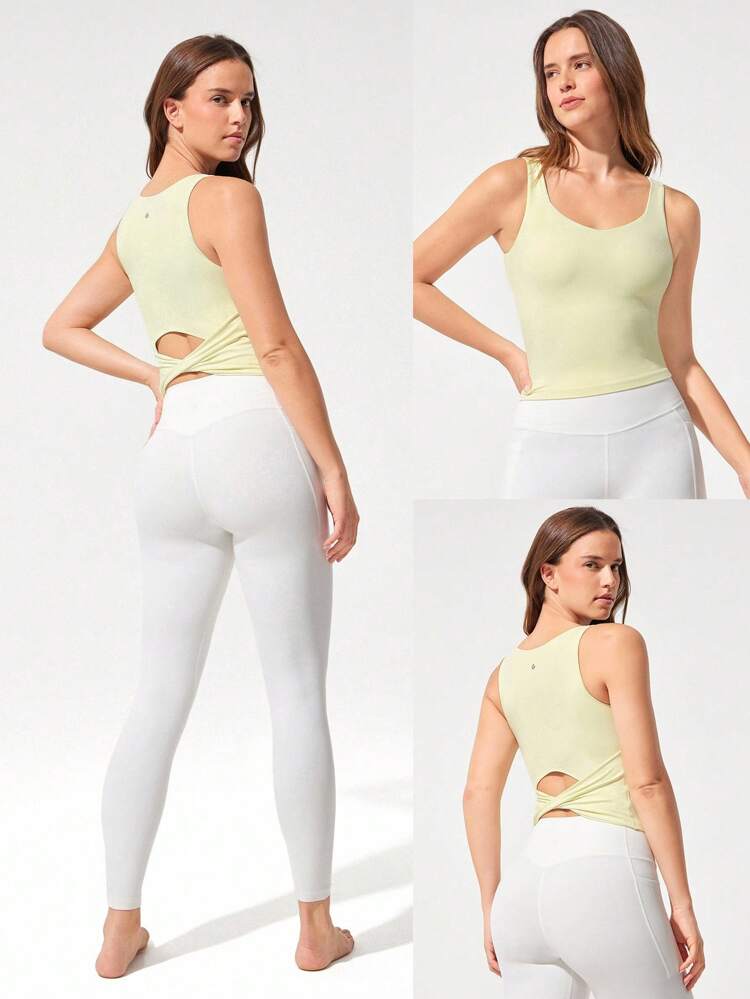 FeatherFit™ Débardeur actif à encolure en cœur avec brassière intégrée absorbante et douce, dos torsadé, pour yoga, pilates, studio et usage quotidien décontracté. Faible impact.