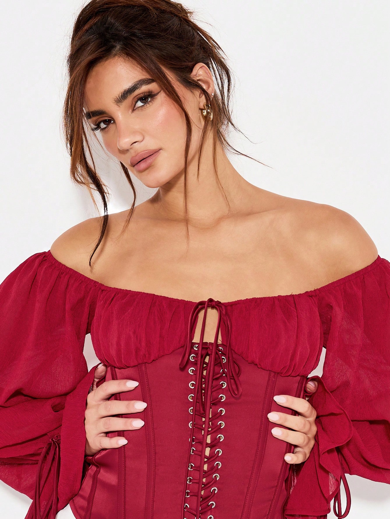 KIZN Top corsetto con spalle scoperte e lacci e maniche a palloncino