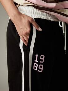 MISSGUIDED Varsity Wide Leg Track Pants Collegiate Style Joggers With Star Details Drawstring Waist Lounge Sweatpants Fall Winter Casual Comfort Streetwear - Black and White - View 4