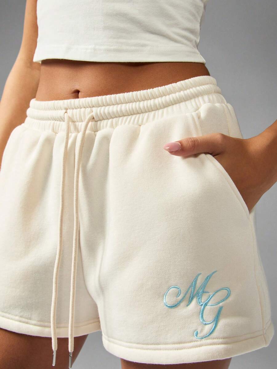 MISSGUIDED 女式刺绣慢跑短裤 MG 标志高腰抽绳套穿夏季休闲海滩舒适短裤 - 杏色 - 查看 1