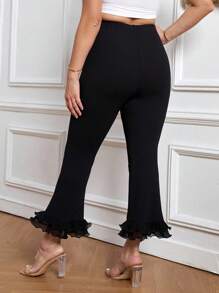 Firerie Pantalones acampanados de talle alto de malla en contraste