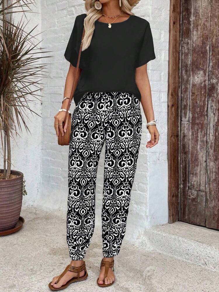 2pc Set Plus Size Women's Summer Casual Vacation Country Solid Color Black Round Neck Loose Blouse Top Shirt And All-Over Print  Floral Print  Pants 2 Pieces Set ,Casual Everyday Set,Summer\Vacation,Summer Holiday,Vacation Outfits Women ,Holiday Outfits For Women,Going Out Outfits, New Clothes,Simple And Fashionable For Everyday Wear,Suitable For Summer, Vacation, Daily Wear, Daily Wear,Country Concert Outfit ,Modest Two Piece Set, Plus Size Summer Sets,Plus Size Pants Set,Boho Set,Boho Pants Set For Women,Wide Leg Pants Set,2 Piece Casual Sets Woman,Two Piece Set Women