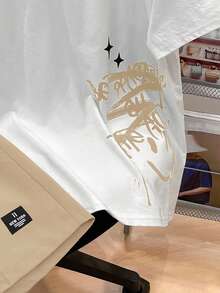 SHEIN Bộ 2 áo thun tay ngắn và quần short thường ngày cho bé trai tuổi teen, phong cách Punk Rock đường phố thích hợp mặc hàng ngày, tiệc tùng, lễ hội âm nhạc, thích hợp cho mùa xuân/hè, họa tiết Graffiti tiếng Anh, màu tương phản - Màu Khaki - Xem 5