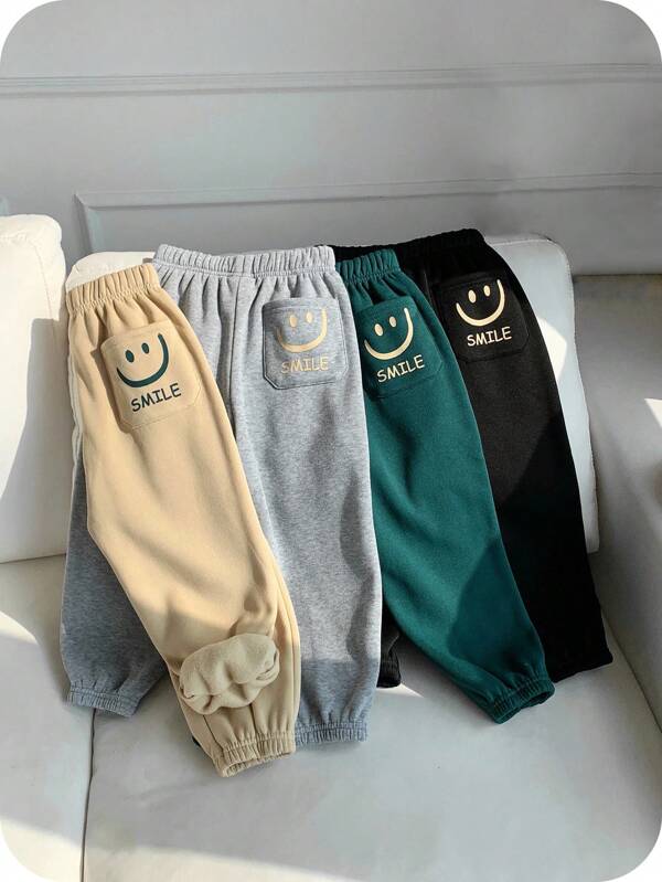 SHEIN 4pcs Young Boys' Casual Comfortable Versatile Cute Printed Fleece Lined Thick Sweatpants, School Clothes Fall Winter