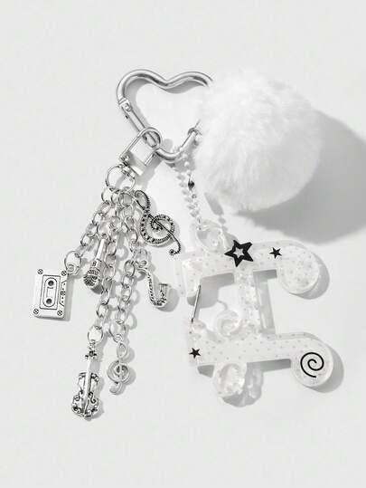 Anime 1 pièce Pendentif minimaliste et chic pour festival de musique haut de gamme avec boule blanche en peluche, ailes en acrylique, note de musique, instrument miniature (tape, cor, violoncelle, microphone), porte-clés en forme de cœur. Convient pour les femmes, port quotidien, cadeau de vacances