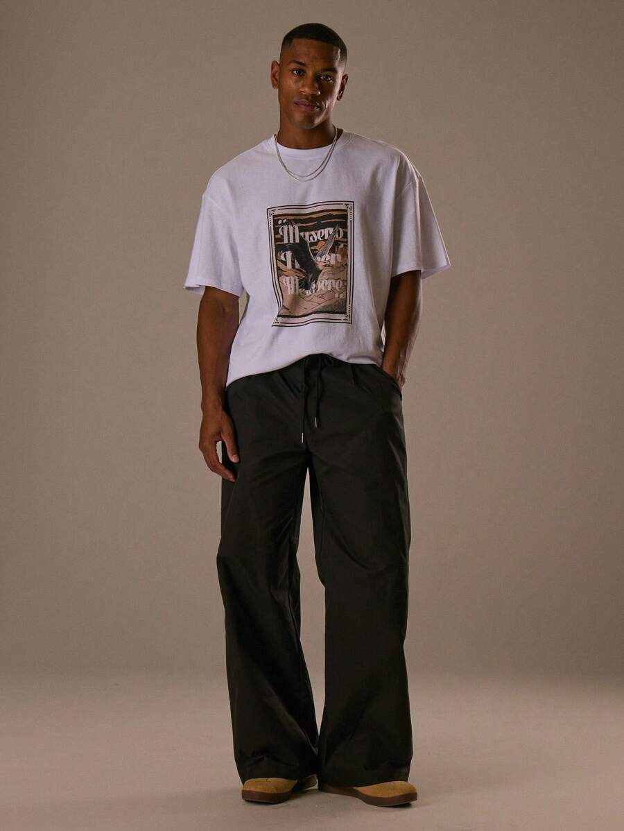 Pantalón holgado básico para hombres con bordado de marca Musero 3D, cintura con cordón elástico, ropa de otoño/primavera verano - Negro - Ver 1