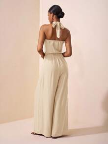 Zivah 2025夏季新款音乐节复活节母亲节婚礼生日派对日常出游基础百搭休闲度假邮轮旅行沙滩海边日光浴网红爆款街头风优雅通勤商务休闲深V领挂脖交叉绑带性感露背百褶宽松阔腿裤女连体裤 - 杏色 - 查看 2