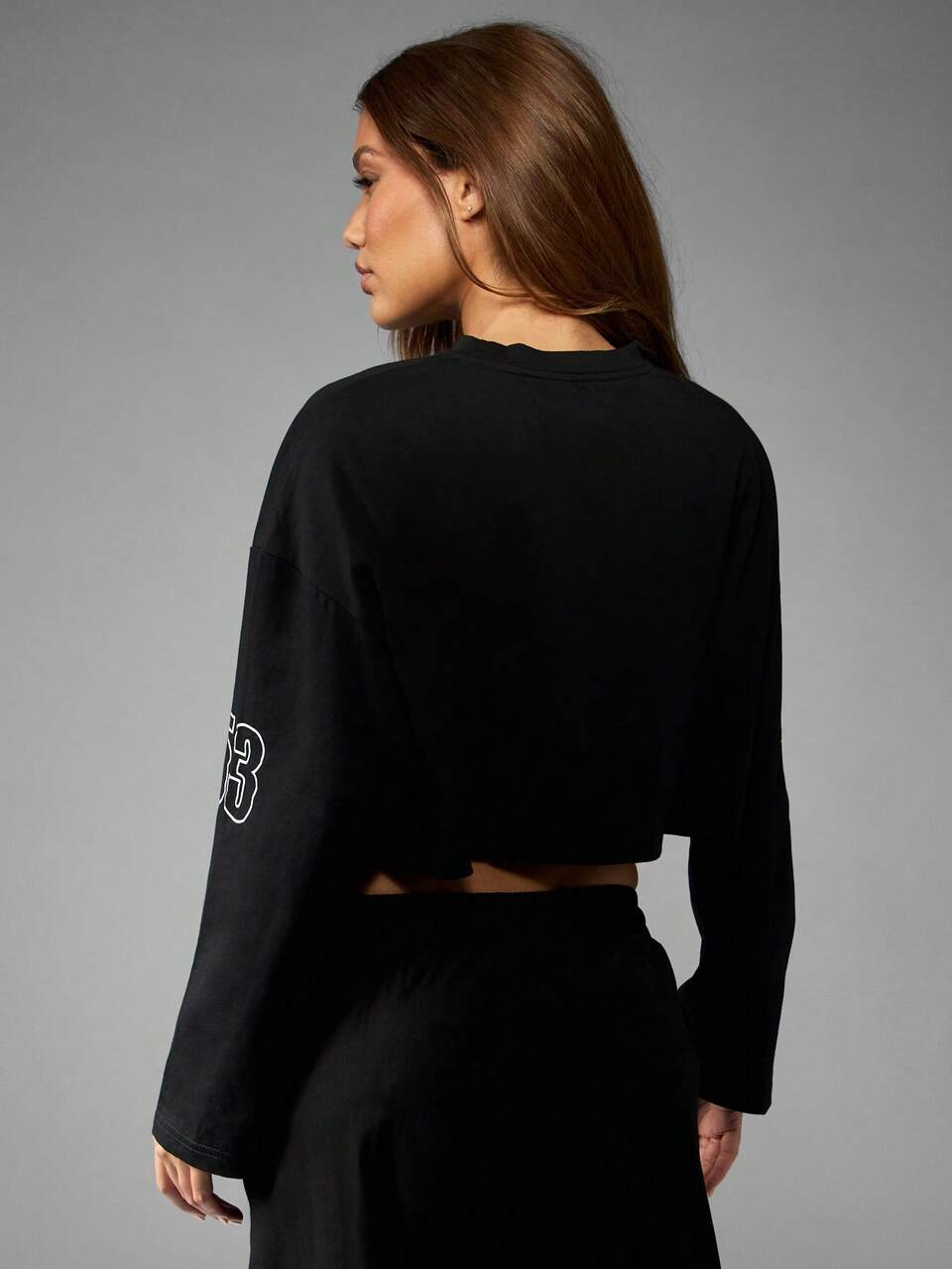 Missguided x Playboy Long Sleeve Cropped Graphic Tee With Racing Design