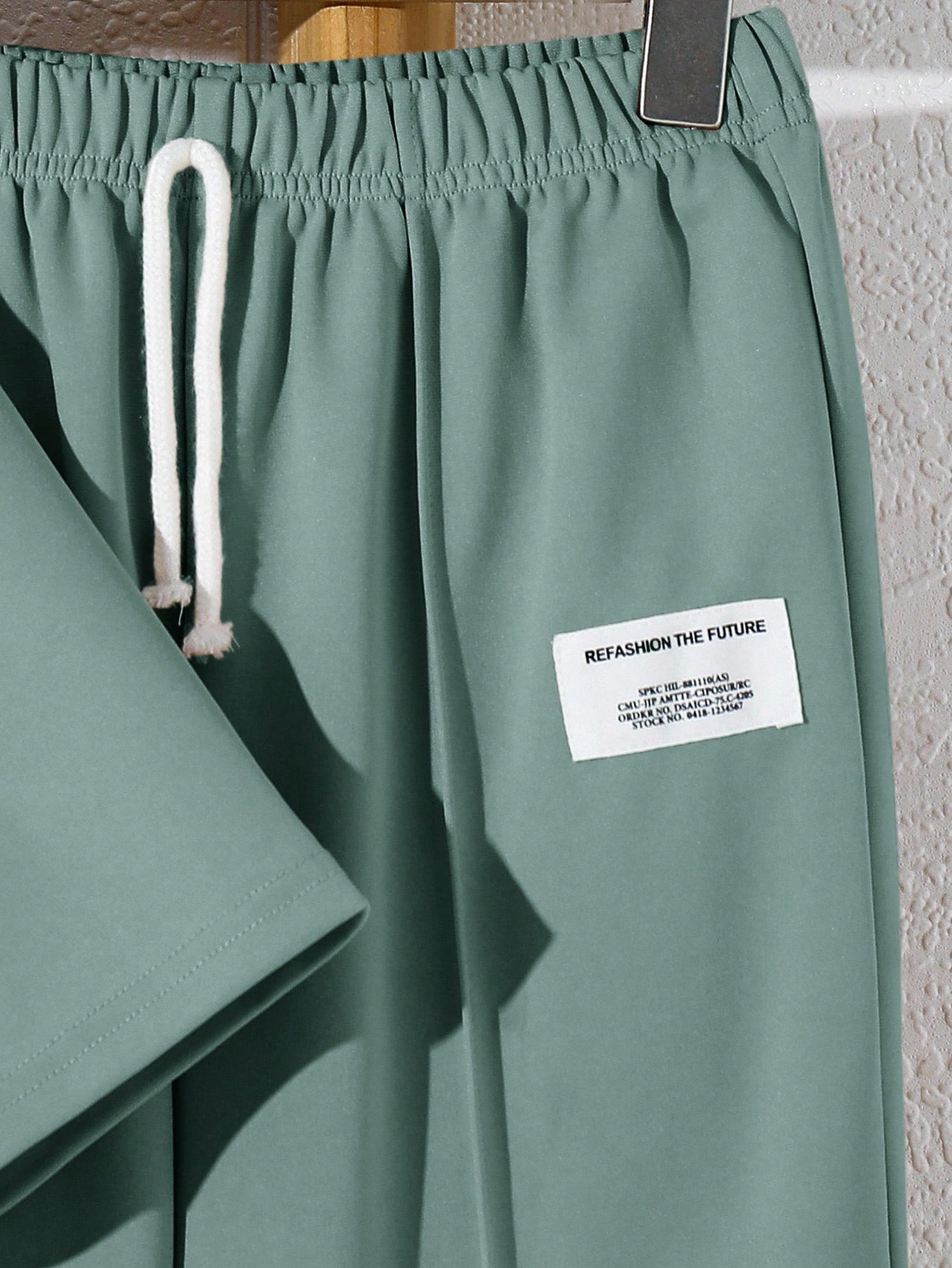 SHEIN مجموعة تي شيرت وبنطلون بياقة مستديرة من قماش...