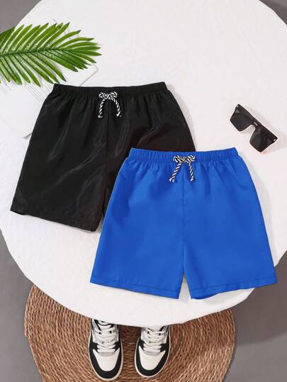 SHEIN 2件套青少年男童纯色宽松梭织沙滩/泳裤，休闲度假