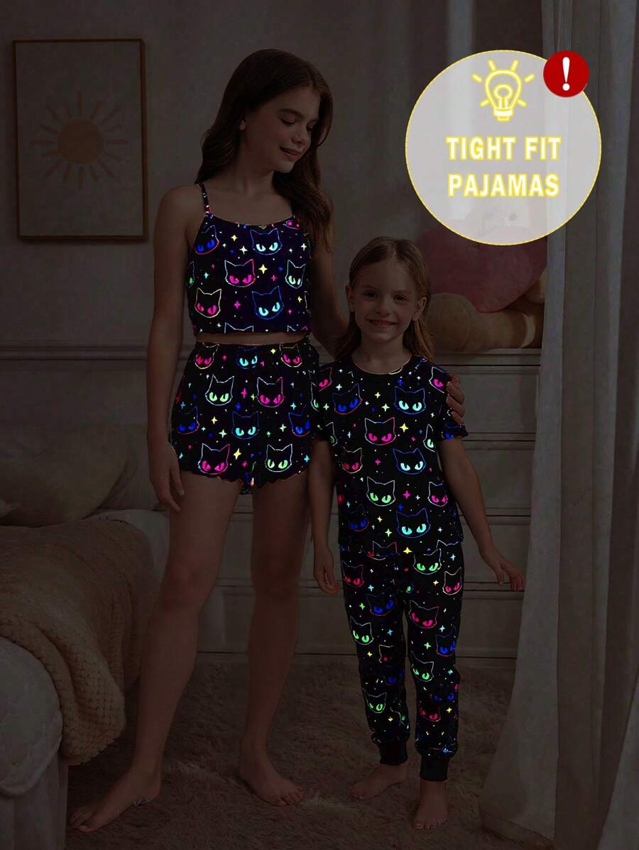 SHEIN 2pcs/Set Young Girls Glowmode Glow-In-The-Dark Cartoon Cat Print T-Shirt Leggings Snug Fit Pajamas Black Summer Fairy Family Matching Sleepwear Set - Black - View 1