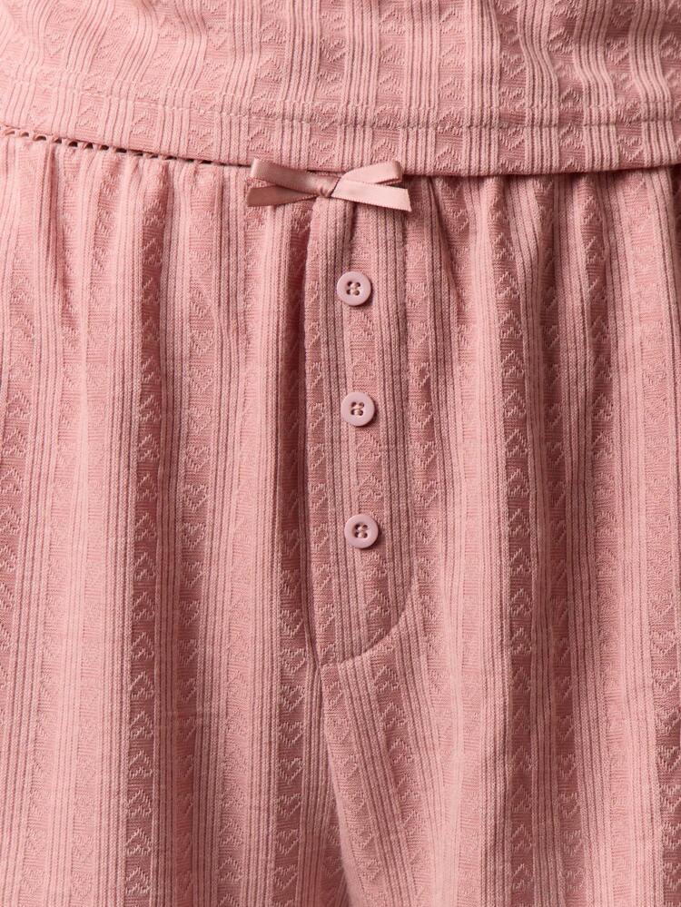 Pointelle-Strickshorts mit Knopfleiste vorn und Schleifendetail