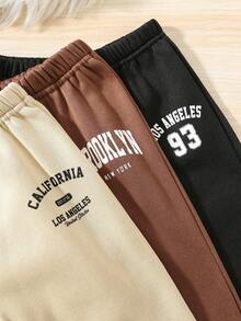 SHEIN 男童休闲学院风舒适时尚简约实用百搭裤子，带有贴片和口袋装饰，适合儿童服装、男童服装、开学返校、日常穿着、旅行、运动、秋冬季 - 彩色 - 查看 3