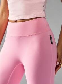 Missguided x Playboy Hoch sitzende ausgestellte Yoga Leggings mit geraffter Rückendetails, Cross-Back Sport-BH, Trainings-Hose für Studio-Praxis - Pink - Übersicht 6
