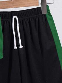 SHEIN 2pcs Tween Boy Sports Textured Fabric Vertical Stripe Pattern Short Sleeve T-Shirt And Shorts Set - Dark Green - View 4