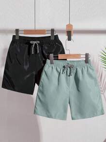 SHEIN 2 件套青少年男童纯色宽松梭织休闲沙滩/泳裤，2 种颜色