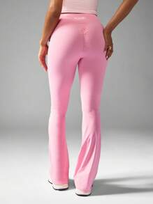 Missguided x Playboy Hoch sitzende ausgestellte Yoga Leggings mit geraffter Rückendetails, Cross-Back Sport-BH, Trainings-Hose für Studio-Praxis - Pink - Übersicht 1