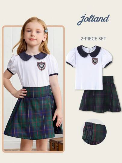 Joliand 2pcs Young Girl Elegant Urban Collegiate Badge Decor White Collar Polo Top With Puff Sleeve And Green Plaid Skirt Set, Suitable For Party, Outing, Daily, Back To School, Summer And Autumn Girls School Clothes Little Girl School Uniform Preppy School Uniform Girls School Uniform Set Plaid Skirt Set Girls Girls Preppy Outfit Toddler Girls School Clothes Back To School  School  Clothes School Supplies Backtoschool ColorfulJoy