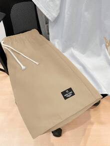 SHEIN Bộ 2 áo thun tay ngắn và quần short thường ngày cho bé trai tuổi teen, phong cách Punk Rock đường phố thích hợp mặc hàng ngày, tiệc tùng, lễ hội âm nhạc, thích hợp cho mùa xuân/hè, họa tiết Graffiti tiếng Anh, màu tương phản - Màu Khaki - Xem 6