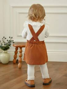 Souflis Souflis 3 pièces/set Barboteuse à manches volantées blanches côtelées mignonnes pour bébé fille, robe sans manches marron avec nœud, et serre-tête avec nœud, tenues d'automne/hiver pour bébé fille. Ensemble 2 pièces de salopette en velours côtelé marron pour bébé fille. Ensemble blouse à volants et jupe à bretelles de style vintage pour toute-petite fille en automne - Multicolore - Voir 3