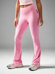 Missguided x Playboy Hoch sitzende ausgestellte Yoga Leggings mit geraffter Rückendetails, Cross-Back Sport-BH, Trainings-Hose für Studio-Praxis - Pink - Übersicht 2