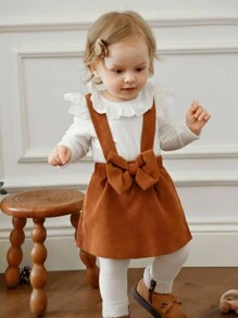 Souflis Souflis 3 pièces/set Barboteuse à manches volantées blanches côtelées mignonnes pour bébé fille, robe sans manches marron avec nœud, et serre-tête avec nœud, tenues d'automne/hiver pour bébé fille. Ensemble 2 pièces de salopette en velours côtelé marron pour bébé fille. Ensemble blouse à volants et jupe à bretelles de style vintage pour toute-petite fille en automne - Multicolore - Voir 5