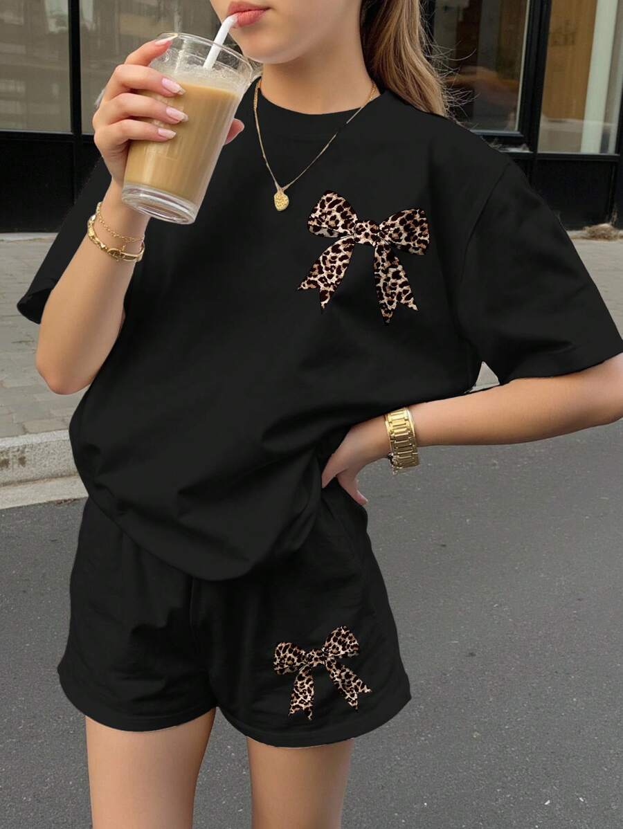 SHEIN Leap Crew Bộ quần short tay ngắn 2 món họa tiết da báo và nơ cổ điển, thường ngày tối giản dành cho bé gái tuổi teen, phù hợp cho mùa hè - màu đen - Xem 1
