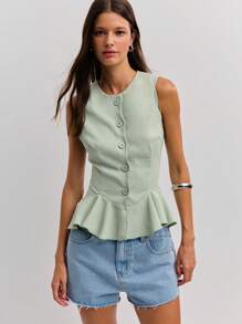 Nöista Vừa sang trọng vừa nữ tính, chiếc áo vest peplum màu xanh bạc hà này lý tưởng cho trang phục mùa thu của phụ nữ, trang phục đi học hoặc trang phục công sở thường ngày. Thiết kế cài nút phía trước và viền bèo nhún tạo nên đường cong quyến rũ, rất phù hợp để mặc nhiều lớp hoặc mặc riêng, mang đến vẻ ngoài thanh lịch, hài hòa trong suốt mùa thu. - Màu xanh Bạc hà - Xem 3