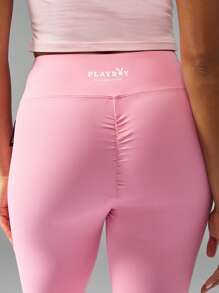 Missguided x Playboy Hoch sitzende ausgestellte Yoga Leggings mit geraffter Rückendetails, Cross-Back Sport-BH, Trainings-Hose für Studio-Praxis - Pink - Übersicht 4