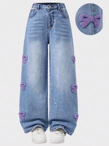 Jeans per ragazze taglie forti, design casual alla moda, toppe con fiocco viola dolce e ricamo a tovagliolo, vita media, pantaloni in denim blu slim fit
