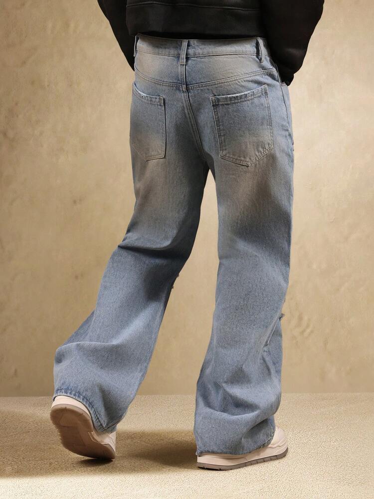 Jean large effet vieilli avec empiècement contrasté