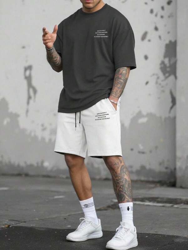 Manfinity Homme Ensemble t-shirt et short décontracté pour homme avec imprimé slogan, été