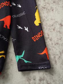 Discovery X SHEIN Jeune garçon T-shirt à manches longues col rond imprimé dinosaure coloré, noir