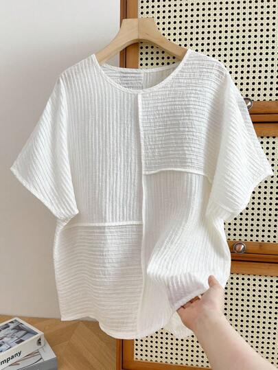 SHEIN Camiseta casual de manga de murciélago de cuello redondo holgada para mujer de talla grande