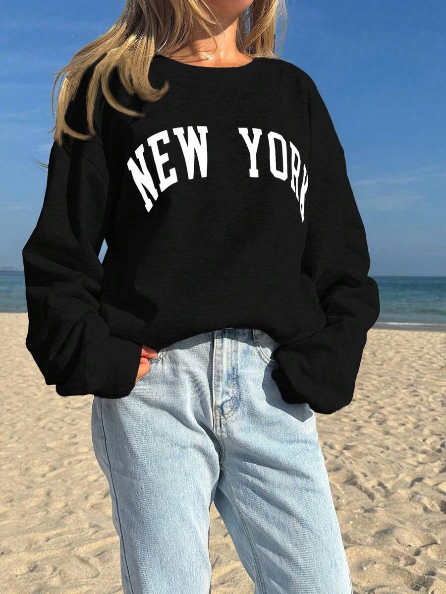 SHEIN Leap Crew Sudadera holgada de cuello redondo de manga larga con estampado gráfico "NEW YORK" de estilo minimalista clásico para adolescentes, adecuada para otoño/invierno - Negro - Ver 1