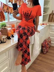CoupledUp Bộ đồ ngủ quần kẻ sọc tay ngắn in họa tiết Halloween dành cho nữ - trái cam - Xem 6
