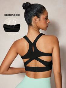 SHEIN Velisys Sujetador deportivo minimalista de unicolor con diseño cruzado y calado para mujeres