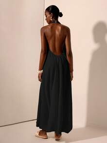 Zivah Lễ hội âm nhạc mới Xuân/Hè 2025, Lễ Phục sinh, Ngày Thánh Patrick, Phong cách phương Tây, Du mục, Tiệc sinh nhật, Tốt nghiệp, Phong cách đại học, Trang phục sinh viên, Thường ngày, Đa năng, Giải trí, Du lịch du thuyền, Bãi biển, Tắm nắng, Lan truyền, Thời trang đường phố, Khách dự tiệc cưới Boho, Đi làm, Ăn trưa, Sân bay, Váy maxi cổ chữ V sâu buộc dây họa tiết màu trắng, Váy maxi hở lưng - màu đen - Xem 2