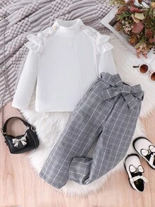 SHEIN 2pcs Young Girls Knitted Ivory Stand Collar Long Sleeve Frill Trim Rose Button Blouse & Plaid Khaki Pants Set, Elegant Commuter Fashion Outfit For Autumn/Winter Girls Plaid Set Girls Checkered Outfit Two Pieces Kids Set Plaid Girl Plaid Pants Set Toddler Girl Plaid Outfit - Grey - View 3