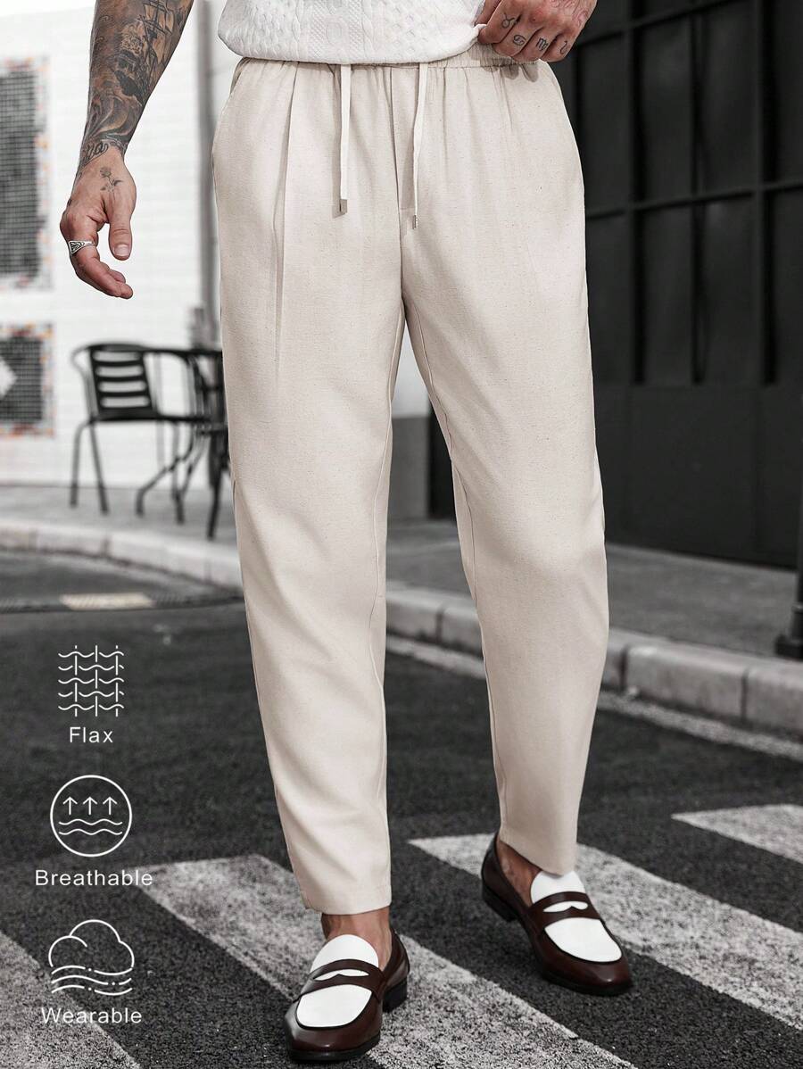 Manfinity Homme Quần vải lanh trơn màu trơn có dây rút, túi chéo, cạp chun cho nam, quần vải lanh công sở thường ngày có dây rút, quần ống rộng - Màu be - Xem 1