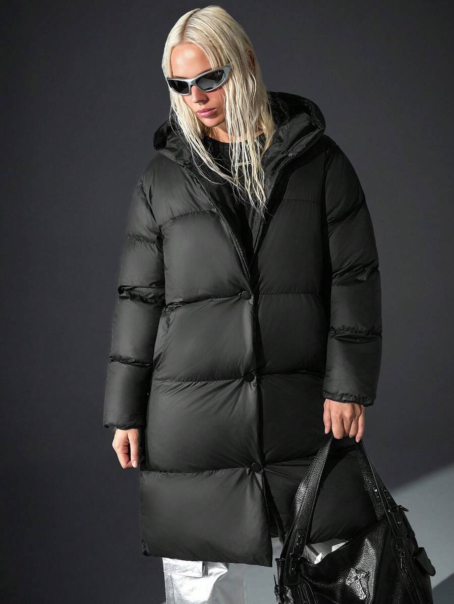 CasuGlow Urban Casual Minimalist Winter Fashion, Long Black Padded Coat, Hooded Design, Full-Length Silhouette, Modern Streetwear Look, Plus Size Travel - Black - View 1