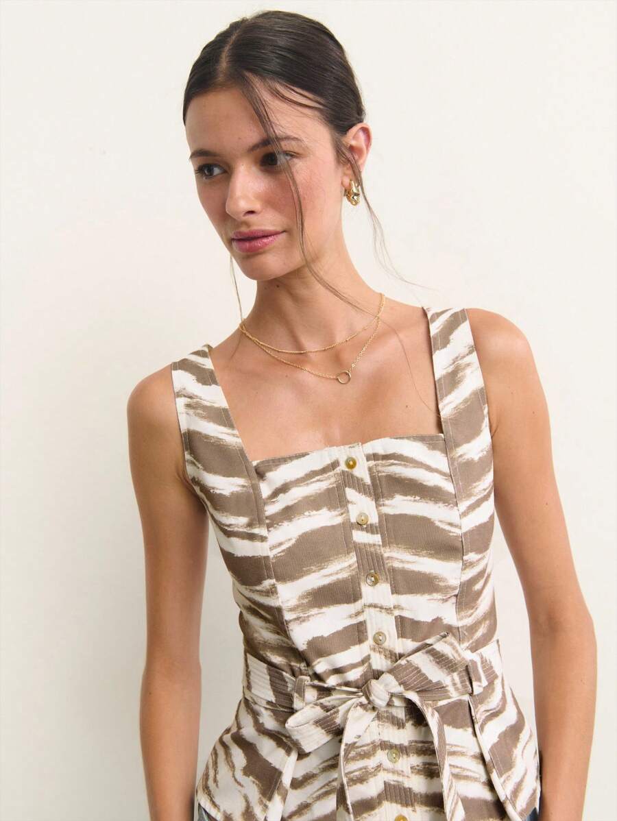 Nöista 这款无袖上衣采用方领和修身剪裁，饰以抽象的棕白条纹图案，打造现代感十足的廓形。中性色调和经典设计，完美契合时尚百搭的夏季女性造型，轻松搭配各种可爱夏装。 - 彩色 - 查看 1