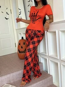 CoupledUp Bộ đồ ngủ quần kẻ sọc tay ngắn in họa tiết Halloween dành cho nữ - trái cam - Xem 4