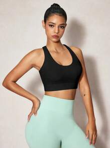 SHEIN Velisys Sujetador deportivo minimalista de unicolor con diseño cruzado y calado para mujeres