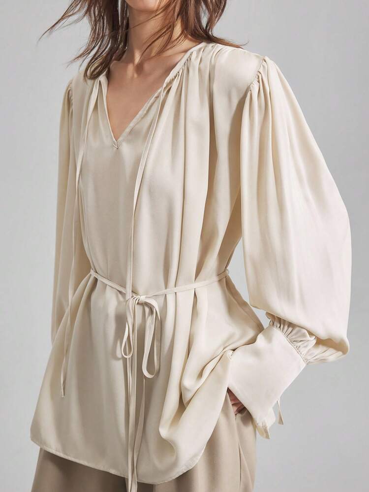 New 2025 Women Elegant Pleated Collar & Cuff Tie Detail Blouse, Round Neck, Long Sleeve, Satin Fabric, Apricot Color, Loose Fit, Casual/Business Wear, Chic Top Business Casual Women's Clothing Office Clothing Low-Key Old Money Style Effortless Temperament High-End Urban Commuting High-Quality Airport Women's Clothing High-End Material Beach Clothing, Bohemian Style Vacation Wear, Summer Ins Celebrity Same Style Vacation Style, Exotic Atmosphere, Country Concert, Western Style Clothing