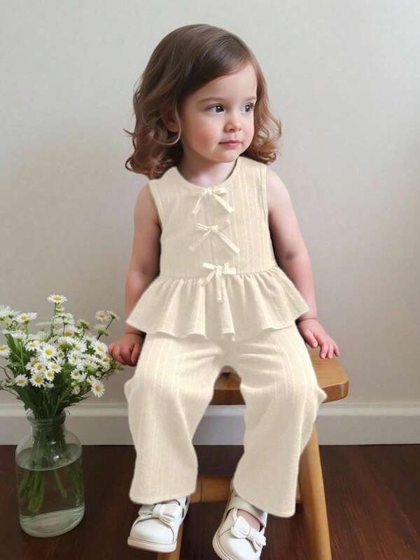 SHEIN Vintaside Kids Set de 2 piezas para niñas bebé con blusa de cuello redondo sin mangas con pliegues y decoración de moño, y pantalones de cintura elástica, cómodo y lindo para primavera, verano y otoño